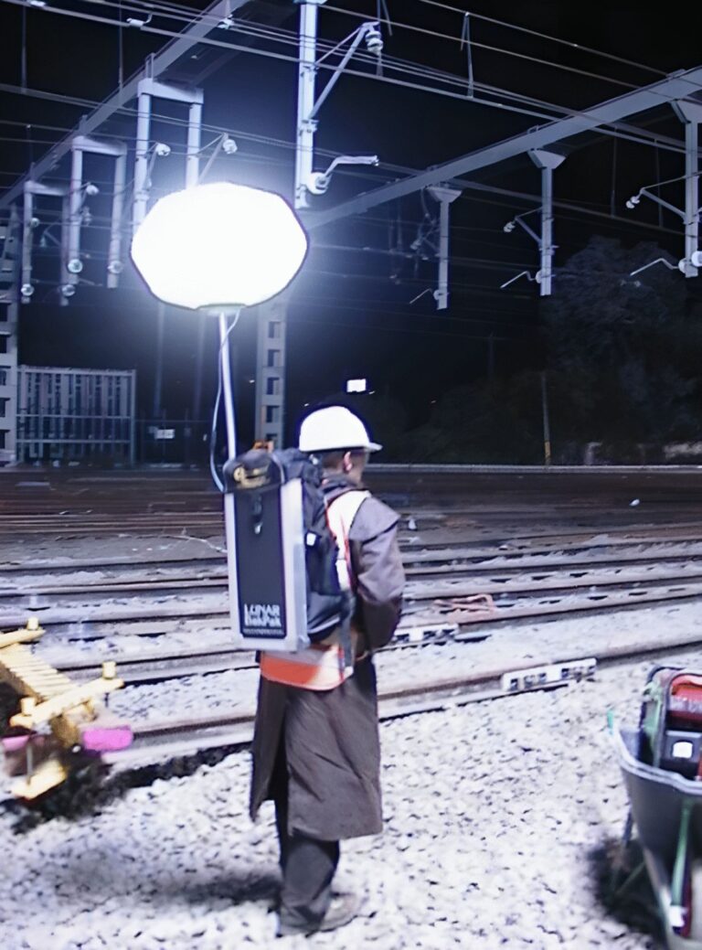 Lunar 12V BakPak Light, a portable, powerful lighting solution with a lightweight design perfect for mobile operations like night maintenance or search-and-rescue.